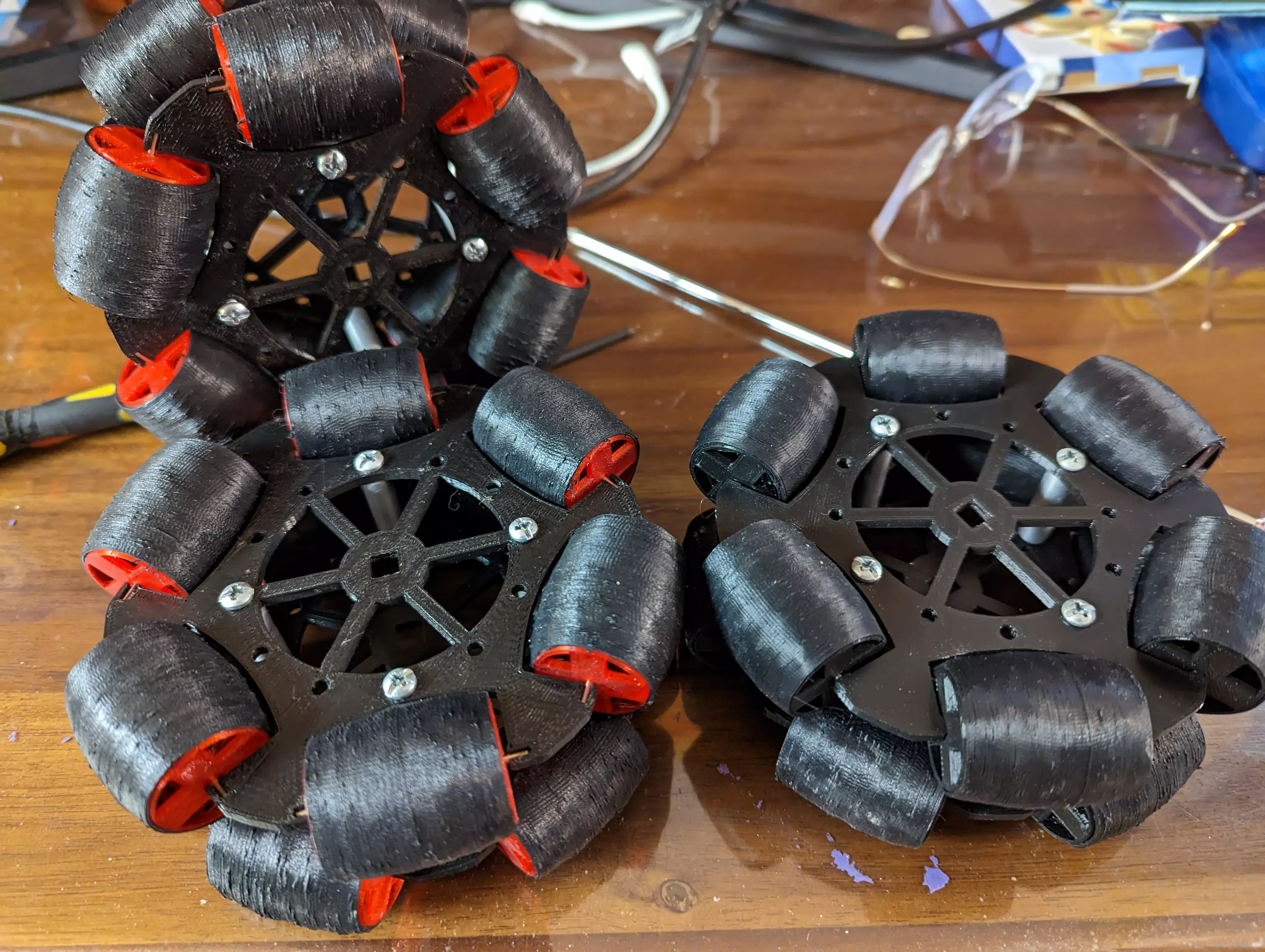 A 3D-printed deprecated omni-wheel with TPU-jacketed rollers