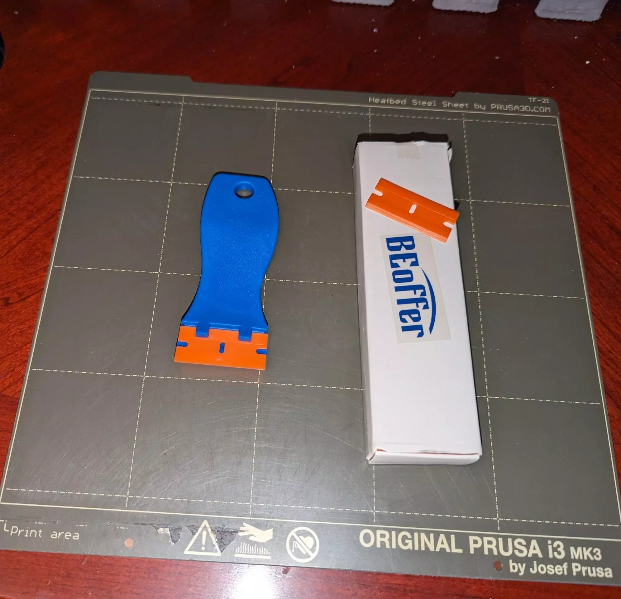 How to scrape 3D-printed plastic off the build surface properly