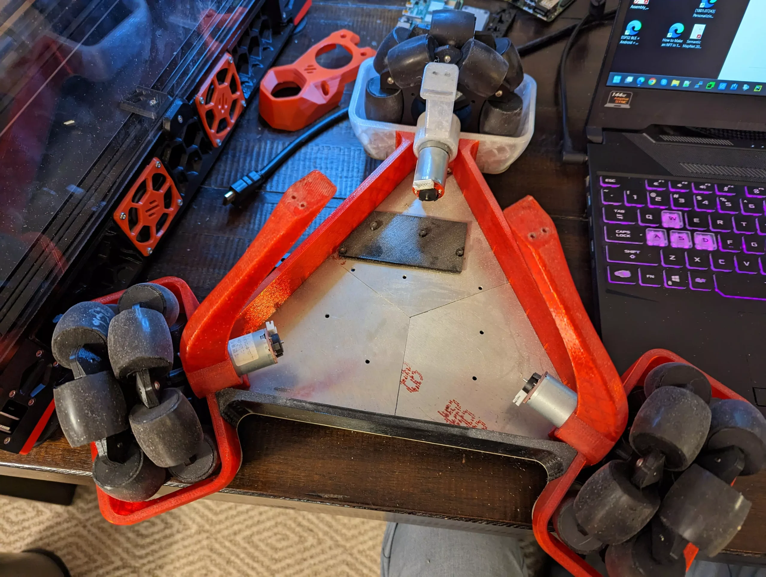 A 3D-printed deprecated omni-wheel with jackets cut from soft tubing