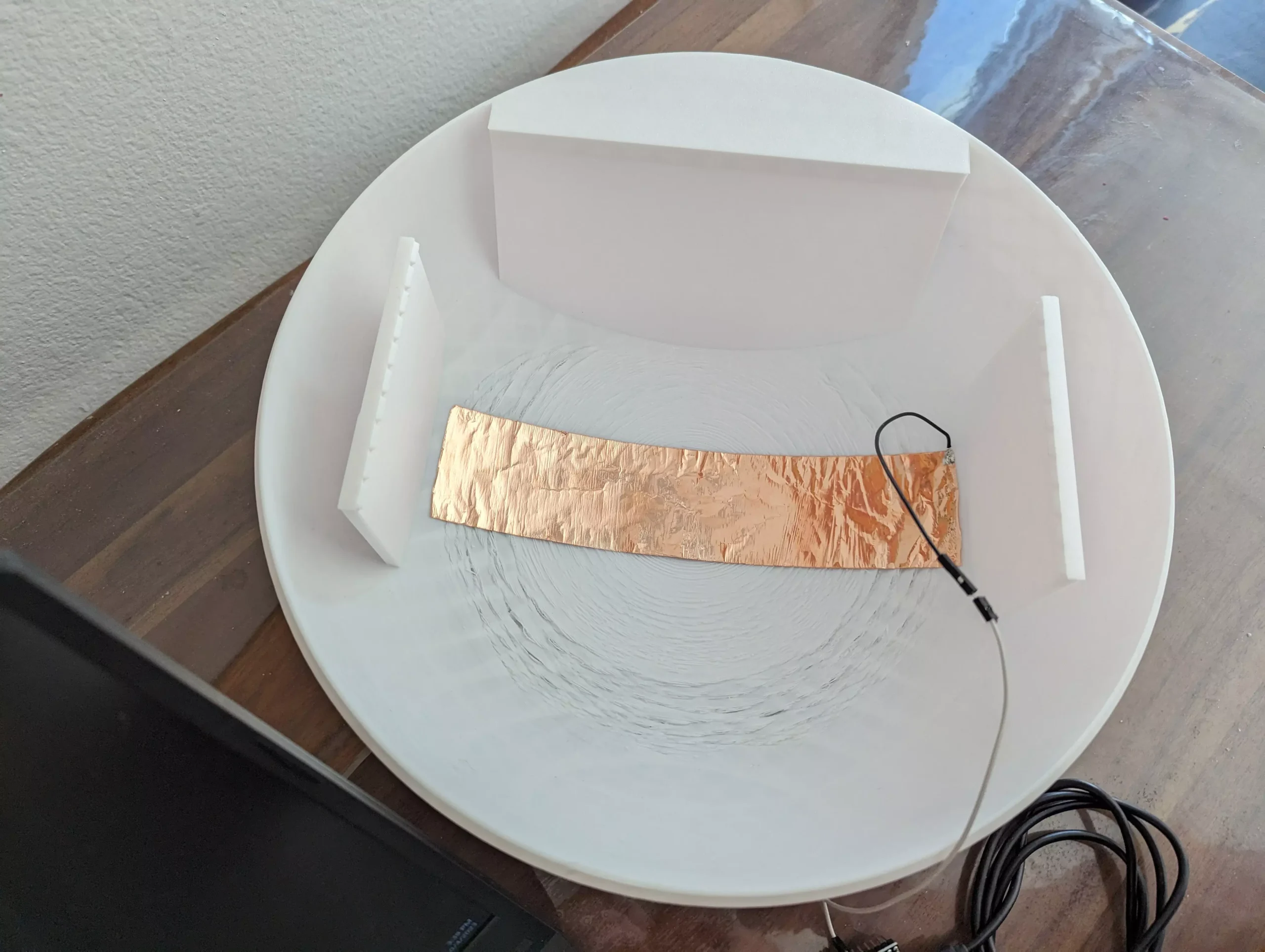 A piece of copper tape placed on the Snoopy''s head underside