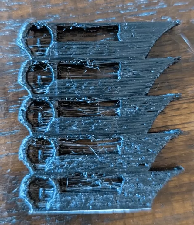Moist ABS filament shows stringing, pockmarks - especially at the bottom