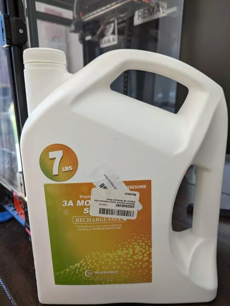 A can of molecular sieve desiccant - front A can of molecular sieve desiccant – front