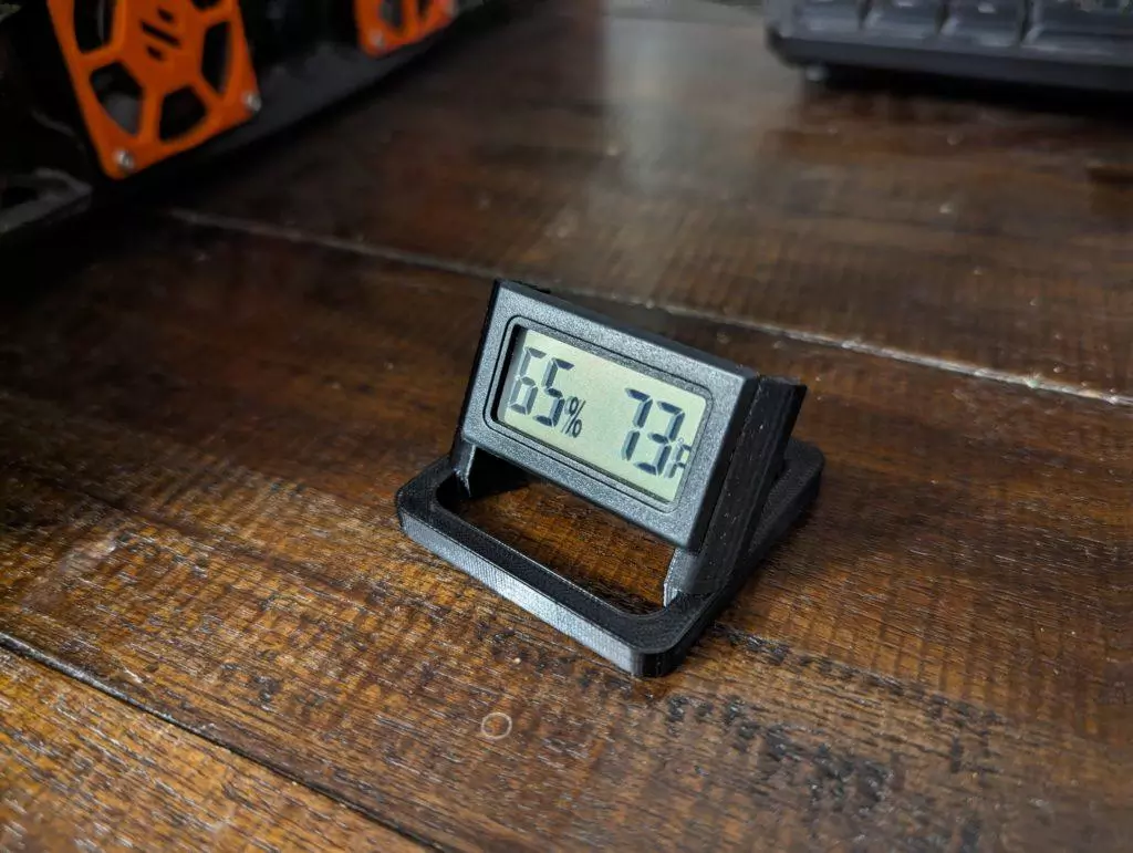 A hygrometer mounted on a pedestal A hygrometer mounted on a pedestal