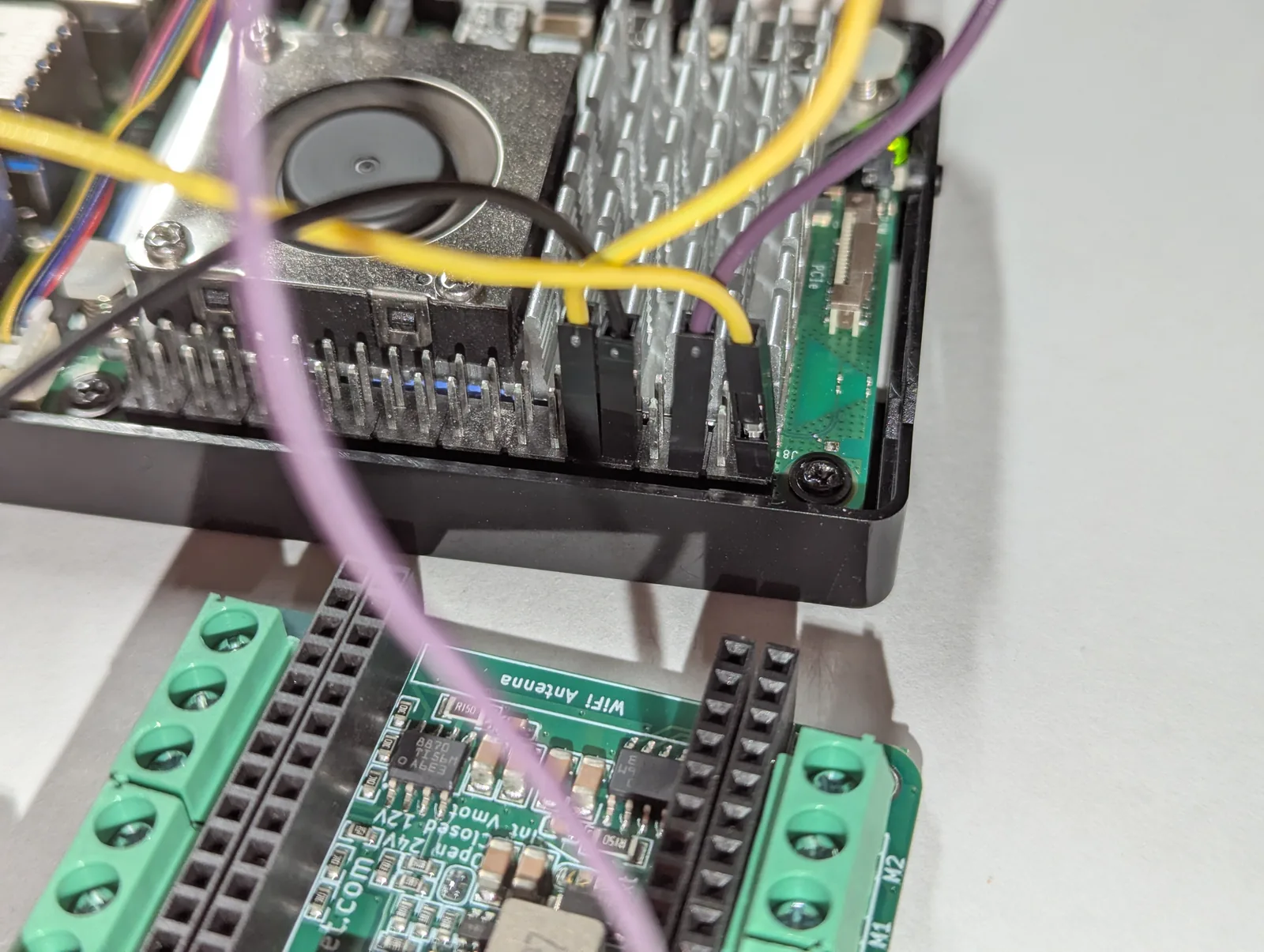 Jumper wires on the Raspberry Pi 5 GPIO header for the Delta-2A