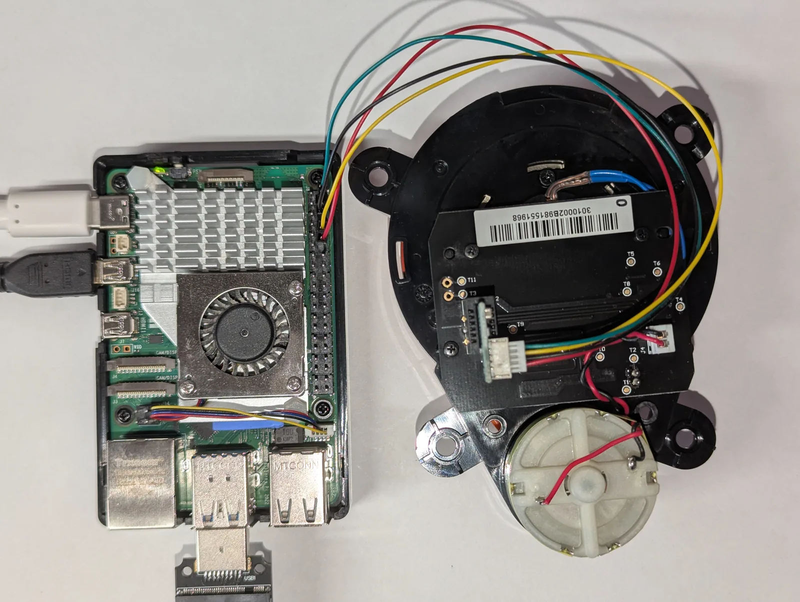 Underside of the Xiaomi LDS02RR showing its drive motor