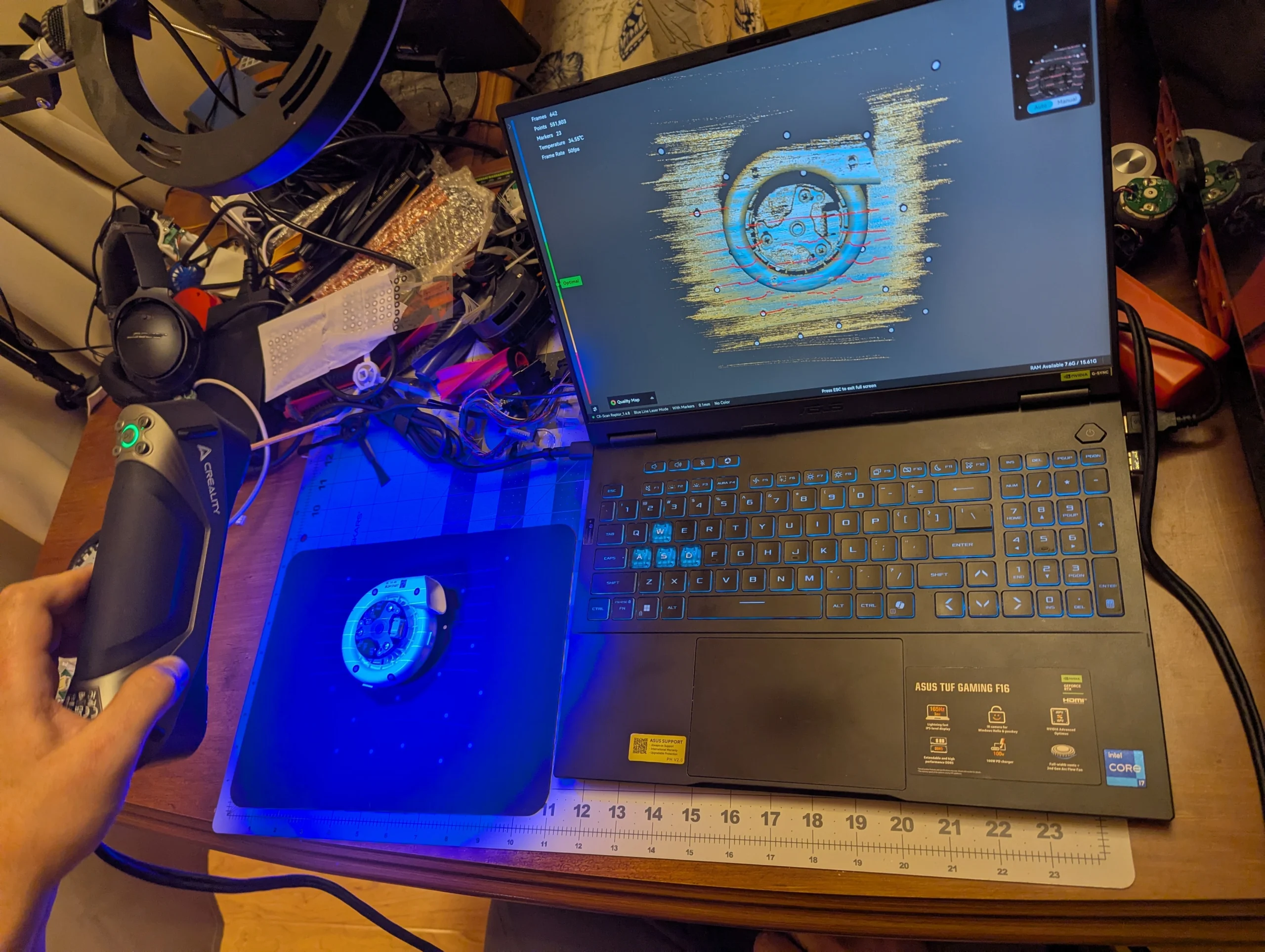 Creality Raptor 3D scanner capturing a robot vacuum suction fan assembly on a desk
